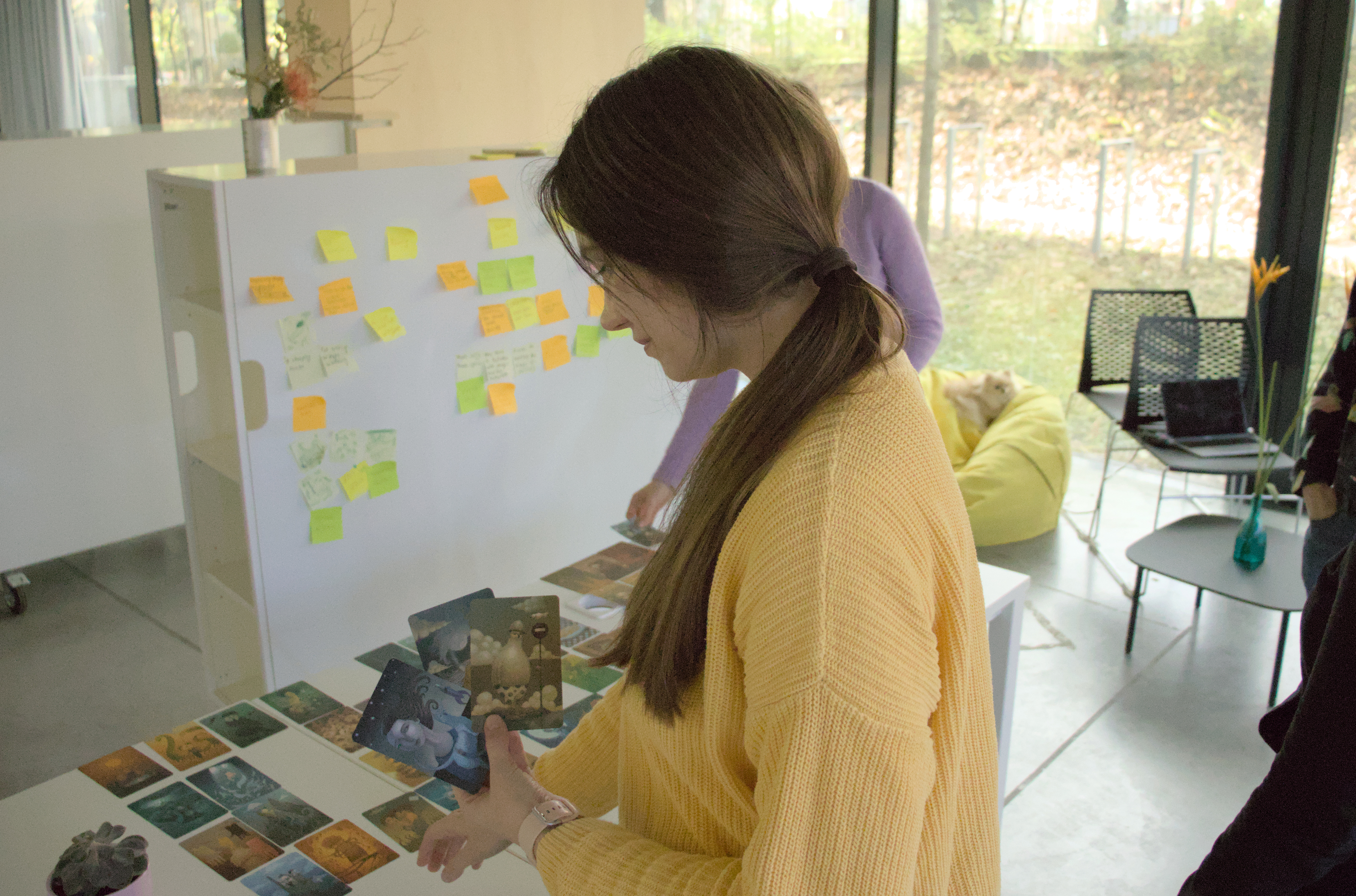 Diana in yellow pullover at workshop